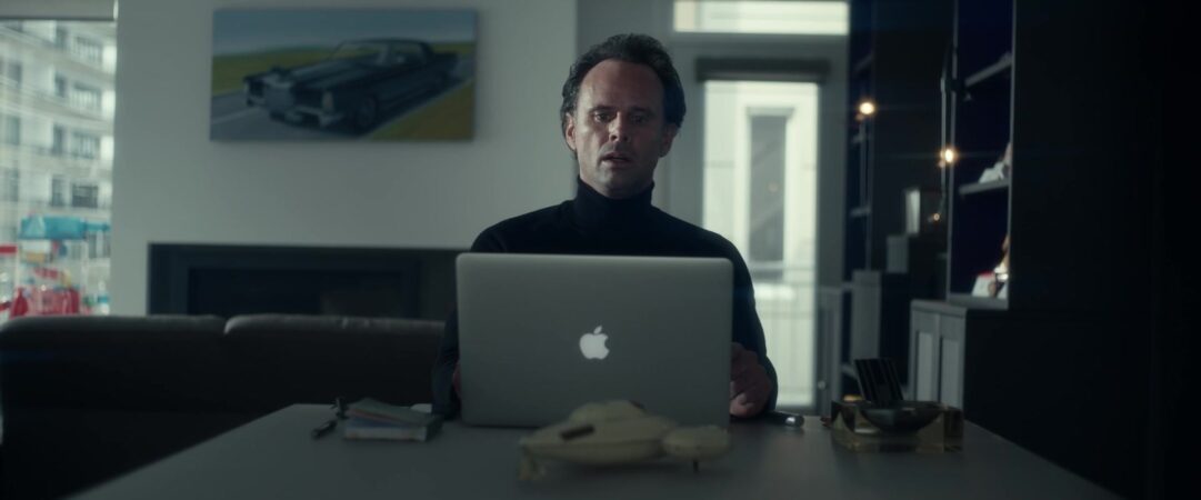 Apple MacBook Pro Laptop of Walton Goggins as Skinny Man in Fatman 2020 Movie 1 scaled
